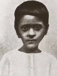 Dr. RadhakrishnaSepia-toned photograph of Dr. Sarvepalli Radhakrishnan at around 8 years old, wearing traditional attire and posing formally.n's pic of 8yr old kid .