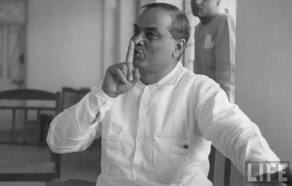 Dr. Bidhan Chandra Roy in 1943, showing him seated (or possibly standing) wearing traditional or formal attire, looking composed and dignified in a studio setting.