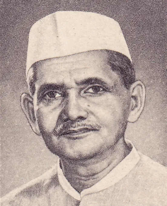 Portrait of Prime Minister Lal Bahadur Shastri wearing a traditional Gandhi cap. The stamp is marked.