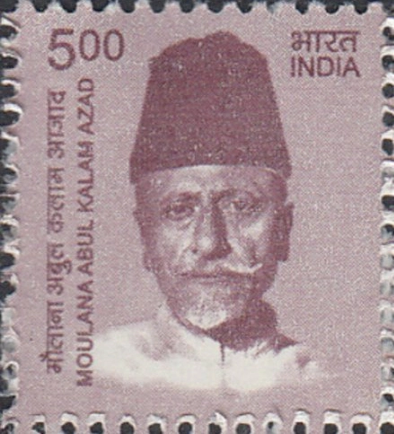 A vintage Indian postage stamp featuring a portrait of Maulana Abul Kalam Azad wearing a fez hat and traditional attire.