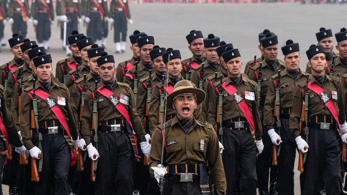 Indian Army soldiers march in formation during a Republic Day parade rehearsal in New Delhi.