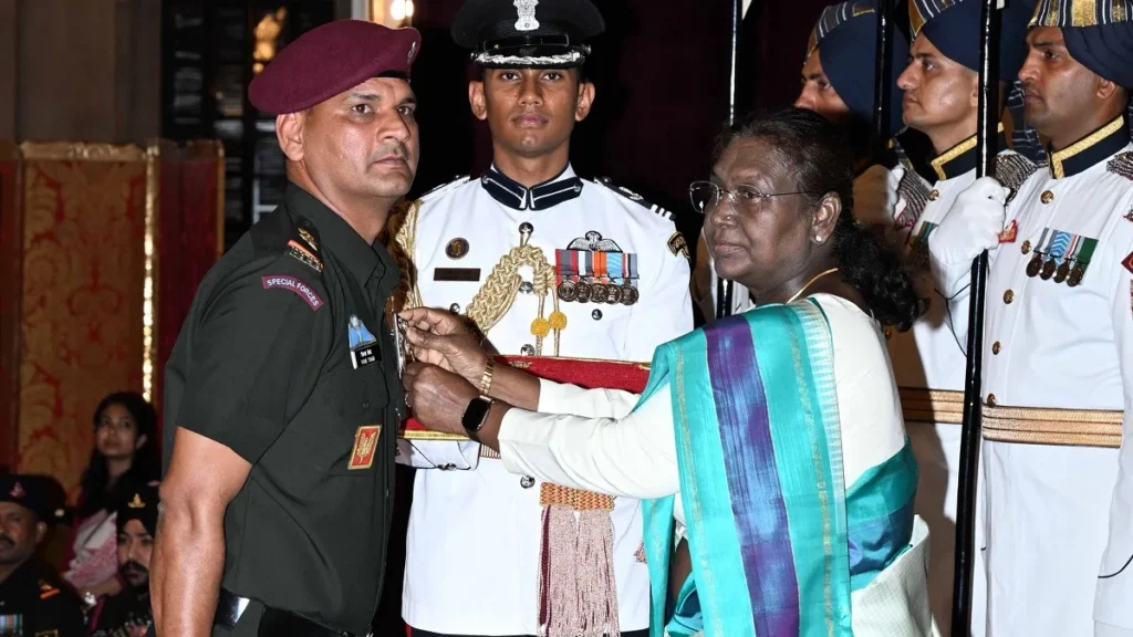 Indian Army officer receiving a gallantry award from the President of India during an official ceremony.