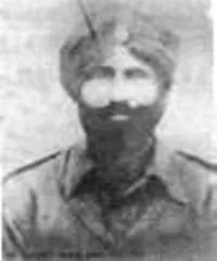 Black-and-white portrait of a man wearing a turban and military-style uniform, facing the camera.