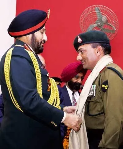 Indian Army soldier receiving the Param Vir Chakra from the President of India at an award ceremony
