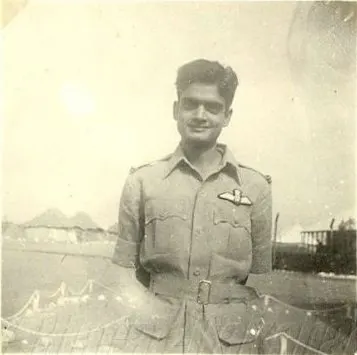 This vintage image shows a group of Indian Air Force personnel gathered in uniform inside an aircraft hangar, symbolizing camaraderie, teamwork, and the proud heritage of India’s military aviation history.